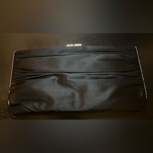 Lulu Townsend pleaded silky black clutch